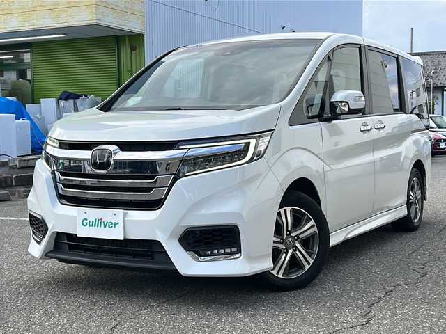 ホンダ ステップワゴン スパーダ eHEV G EXホンダS 福井県 2022(令4)年 5.9万km プラチナホワイトパール ナビ装着スペシャルパッケージ/＋ETC2.0車載機（ナビ連動）/ホンダセンシング/ターボ/純正10インチメモリナビゲーション/（CD/DVD/BT）/フルセグテレビ/バックカメラ/アダプティブクルーズコントロール/レーンキープアシスト/わくわくゲート/LEDヘッドライト/LEDフォグランプ/ドライブレコーダー（前後）/ハーフレザーシート/純正16インチアルミホイール/両側電動スライドドア/前席シートヒーター/3列シート/ウォークスルー/ステアリングリモコン/オートリトラミラー/オートライト/スマートキー/プッシュスタート/保証書/取扱説明書