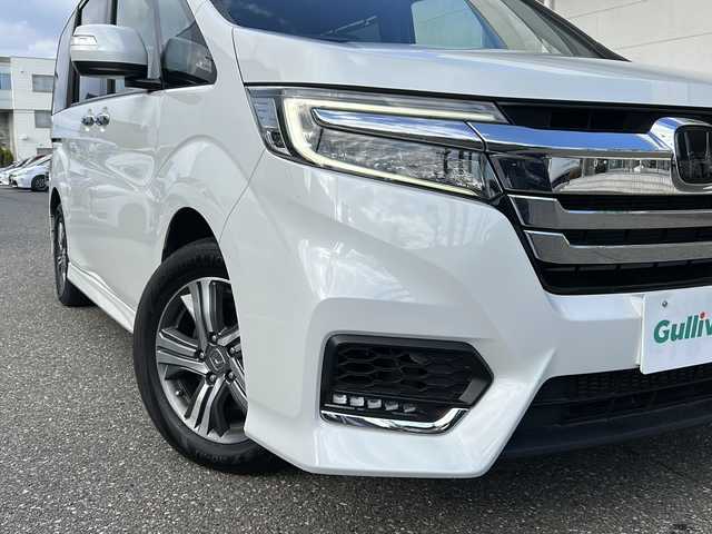 ホンダ ステップワゴン スパーダ eHEV G EXホンダS 福井県 2022(令4)年 5.9万km プラチナホワイトパール ナビ装着スペシャルパッケージ/＋ETC2.0車載機（ナビ連動）/ホンダセンシング/ターボ/純正10インチメモリナビゲーション/（CD/DVD/BT）/フルセグテレビ/バックカメラ/アダプティブクルーズコントロール/レーンキープアシスト/わくわくゲート/LEDヘッドライト/LEDフォグランプ/ドライブレコーダー（前後）/ハーフレザーシート/純正16インチアルミホイール/両側電動スライドドア/前席シートヒーター/3列シート/ウォークスルー/ステアリングリモコン/オートリトラミラー/オートライト/スマートキー/プッシュスタート/保証書/取扱説明書