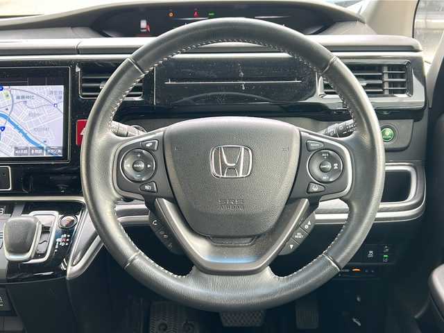 ホンダ ステップワゴン スパーダ eHEV G EXホンダS 福井県 2022(令4)年 5.9万km プラチナホワイトパール ナビ装着スペシャルパッケージ/＋ETC2.0車載機（ナビ連動）/ホンダセンシング/ターボ/純正10インチメモリナビゲーション/（CD/DVD/BT）/フルセグテレビ/バックカメラ/アダプティブクルーズコントロール/レーンキープアシスト/わくわくゲート/LEDヘッドライト/LEDフォグランプ/ドライブレコーダー（前後）/ハーフレザーシート/純正16インチアルミホイール/両側電動スライドドア/前席シートヒーター/3列シート/ウォークスルー/ステアリングリモコン/オートリトラミラー/オートライト/スマートキー/プッシュスタート/保証書/取扱説明書