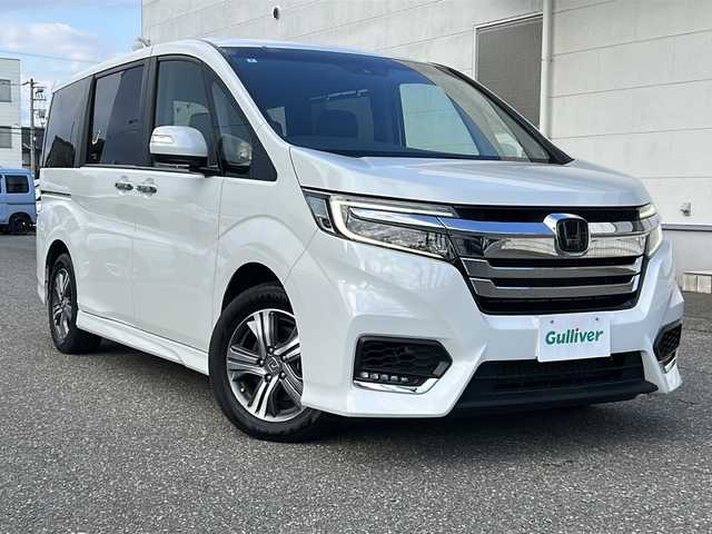 ホンダ ステップワゴン スパーダ eHEV G EXホンダS 福井県 2022(令4)年 5.9万km プラチナホワイトパール ナビ装着スペシャルパッケージ/＋ETC2.0車載機（ナビ連動）/ホンダセンシング/ターボ/純正10インチメモリナビゲーション/（CD/DVD/BT）/フルセグテレビ/バックカメラ/アダプティブクルーズコントロール/レーンキープアシスト/わくわくゲート/LEDヘッドライト/LEDフォグランプ/ドライブレコーダー（前後）/ハーフレザーシート/純正16インチアルミホイール/両側電動スライドドア/前席シートヒーター/3列シート/ウォークスルー/ステアリングリモコン/オートリトラミラー/オートライト/スマートキー/プッシュスタート/保証書/取扱説明書