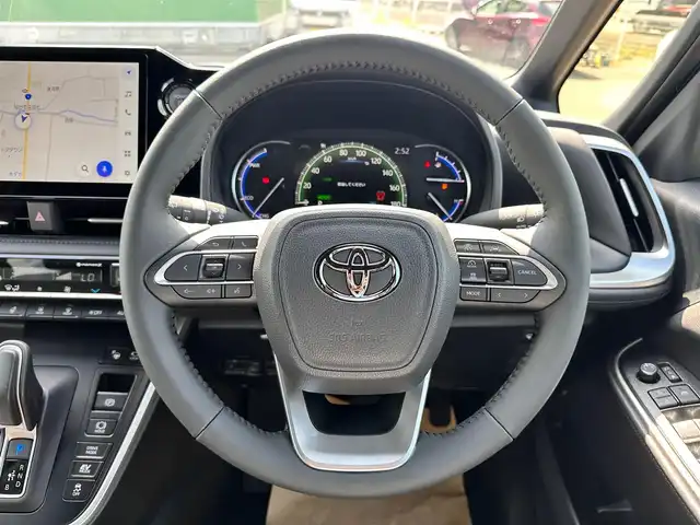 トヨタ ヴォクシー ハイブリッド S－Z 宮城県 2025(令7)年 0.1万km未満 アティチュードブラックマイカ ディスプレイオーディオプラス/・コネクティッドナビ対応10.5インチディスプレイ/・車載メモリーナビ/・CD/DVD/・地デジTV/・USB/HDMI/・AppleCarPlay/AndroidAuto/・ETC2.0/快適利便パッケージHigh/・ハンズフリーパワースライドドア/・パワーバックドア/・ナノイーX/・ステアリングヒーター/・シートヒーター（2列目左右）/・オットマン（2列目左右/・角度調整付きアームレスト（2列目左右）/トヨタチームメイト/・アドバンストパーク（リモート機能付）/・パーキングサポートブレーキ（周囲静止物/後方歩行者）/寒冷地仕様/＝＝＝/セーフティセンス/・プリクラッシュセーフティ/・レーントレーシングアシスト/・レーンディパーチャーアラート/・レーダークルーズコントロール/・オートマチックハイビーム/・ロードサインアシスト/・ドライバー異常時対応システム/・プロアクティブドライビングアシスト/・発進遅れ告知機能/アクセサリーコンセント（AC100V/1500W）/ハーフレザーシート/快適温熱シート（前席）/LEDヘッドランプ