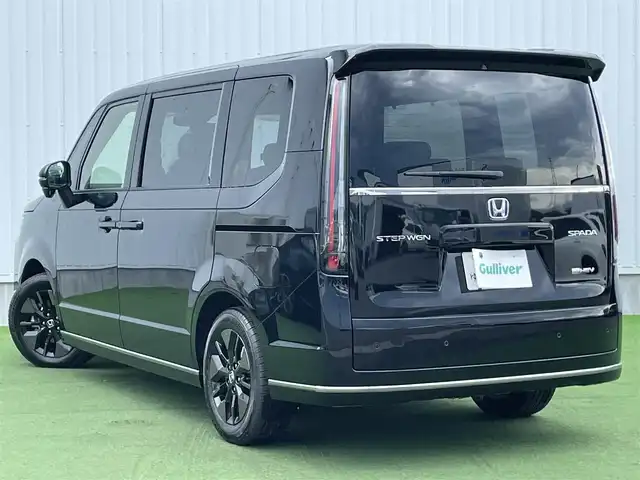 ホンダ ステップワゴン スパーダ eHEV 香川県 2025(令7)年 0.1千km クリスタルブラックパール 登録時走行距離：６ｋｍ/登録済未使用車/ホンダセンシング　/純正ナビゲーション/→フルセグ　/→ＣＤ／ＤＶＤ　/レーダークルーズコントロール/ブラインドスポットモニター/ステアリングリモコン/革巻きステアリング　　/シートヒーター　/両側パワースライド　/フリップダウンモニター　/オットマン　/ＬＥＤオートライト　/フォグランプ/前後コーナーセンサー/スマートキー/スペアキー