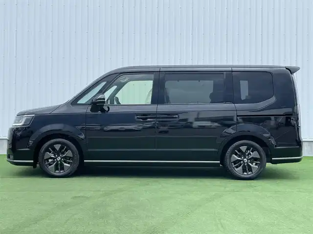 ホンダ ステップワゴン スパーダ eHEV 香川県 2025(令7)年 0.1千km クリスタルブラックパール 登録時走行距離：６ｋｍ/登録済未使用車/ホンダセンシング　/純正ナビゲーション/→フルセグ　/→ＣＤ／ＤＶＤ　/レーダークルーズコントロール/ブラインドスポットモニター/ステアリングリモコン/革巻きステアリング　　/シートヒーター　/両側パワースライド　/フリップダウンモニター　/オットマン　/ＬＥＤオートライト　/フォグランプ/前後コーナーセンサー/スマートキー/スペアキー