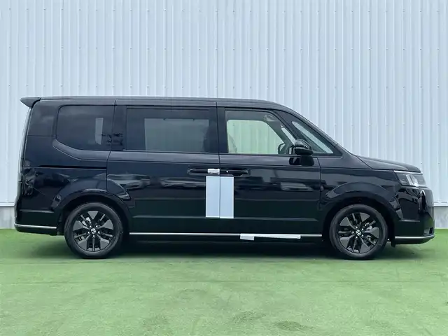 ホンダ ステップワゴン スパーダ eHEV 香川県 2025(令7)年 0.1千km クリスタルブラックパール 登録時走行距離：６ｋｍ/登録済未使用車/ホンダセンシング　/純正ナビゲーション/→フルセグ　/→ＣＤ／ＤＶＤ　/レーダークルーズコントロール/ブラインドスポットモニター/ステアリングリモコン/革巻きステアリング　　/シートヒーター　/両側パワースライド　/フリップダウンモニター　/オットマン　/ＬＥＤオートライト　/フォグランプ/前後コーナーセンサー/スマートキー/スペアキー