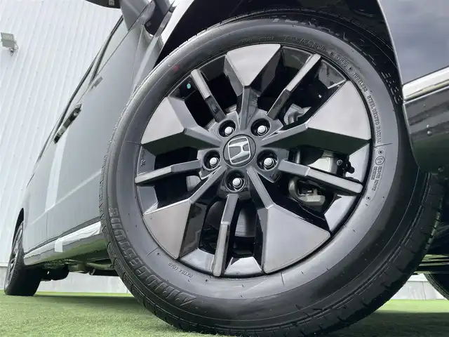 ホンダ ステップワゴン スパーダ eHEV 香川県 2025(令7)年 0.1千km クリスタルブラックパール 登録時走行距離：６ｋｍ/登録済未使用車/ホンダセンシング　/純正ナビゲーション/→フルセグ　/→ＣＤ／ＤＶＤ　/レーダークルーズコントロール/ブラインドスポットモニター/ステアリングリモコン/革巻きステアリング　　/シートヒーター　/両側パワースライド　/フリップダウンモニター　/オットマン　/ＬＥＤオートライト　/フォグランプ/前後コーナーセンサー/スマートキー/スペアキー
