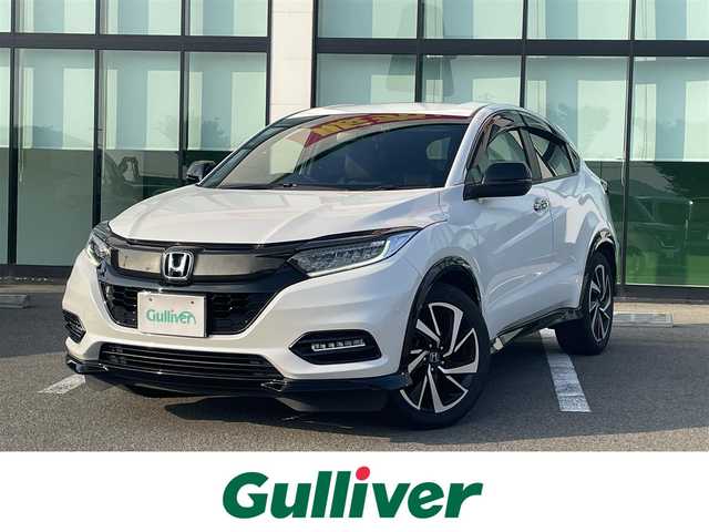 ホンダ ヴェゼル RS ホンダセンシング 和歌山県 2018(平30)年 5.2万km プラチナホワイトパール 純正7インチナビ（VXM-184VFi）/フルセグTV/Bluetooth/CD/DVD/バックカメラ/ETC/ドライブレコーダー/ホンダセンシング/衝突軽減カメラ/車線逸脱防止機能/アダプティブクルーズコントロール/革巻きステアリング/パドルシフト/ステアリングスイッチ/ハーフレザーシート/前席シートヒーター/電動パーキングブレーキ/オートブレーキホールド/LEDヘッドライト/フォグランプ/オートライト/純正18インチAW/ドアバイザー/プッシュスタート/スマートキー