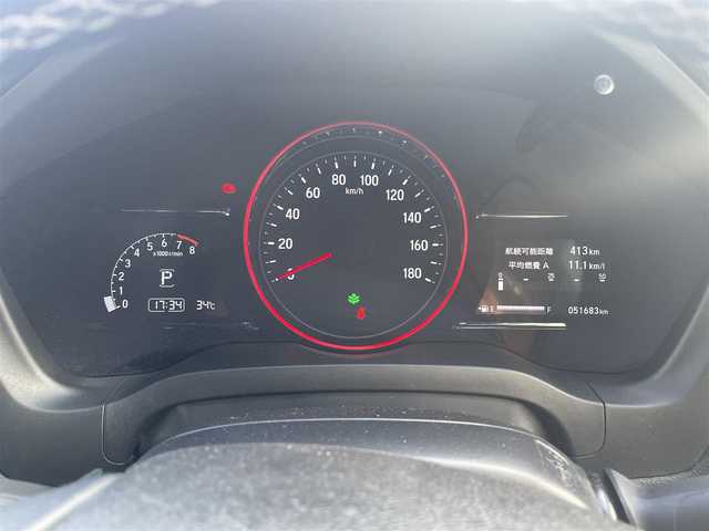ホンダ ヴェゼル RS ホンダセンシング 和歌山県 2018(平30)年 5.2万km プラチナホワイトパール 純正7インチナビ（VXM-184VFi）/フルセグTV/Bluetooth/CD/DVD/バックカメラ/ETC/ドライブレコーダー/ホンダセンシング/衝突軽減カメラ/車線逸脱防止機能/アダプティブクルーズコントロール/革巻きステアリング/パドルシフト/ステアリングスイッチ/ハーフレザーシート/前席シートヒーター/電動パーキングブレーキ/オートブレーキホールド/LEDヘッドライト/フォグランプ/オートライト/純正18インチAW/ドアバイザー/プッシュスタート/スマートキー