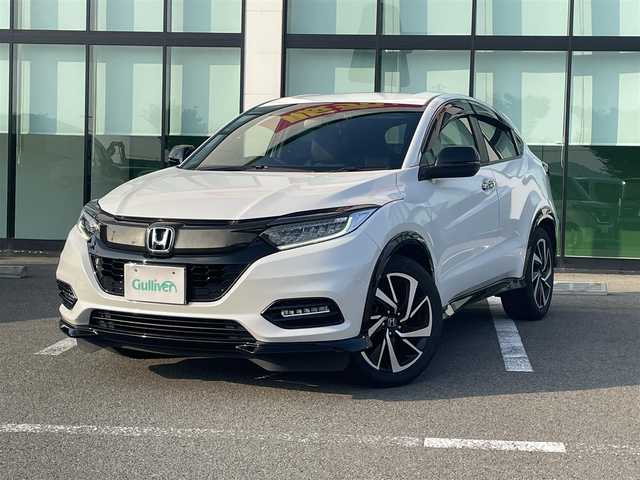 ホンダ ヴェゼル RS ホンダセンシング 和歌山県 2018(平30)年 5.2万km プラチナホワイトパール 純正7インチナビ（VXM-184VFi）/フルセグTV/Bluetooth/CD/DVD/バックカメラ/ETC/ドライブレコーダー/ホンダセンシング/衝突軽減カメラ/車線逸脱防止機能/アダプティブクルーズコントロール/革巻きステアリング/パドルシフト/ステアリングスイッチ/ハーフレザーシート/前席シートヒーター/電動パーキングブレーキ/オートブレーキホールド/LEDヘッドライト/フォグランプ/オートライト/純正18インチAW/ドアバイザー/プッシュスタート/スマートキー