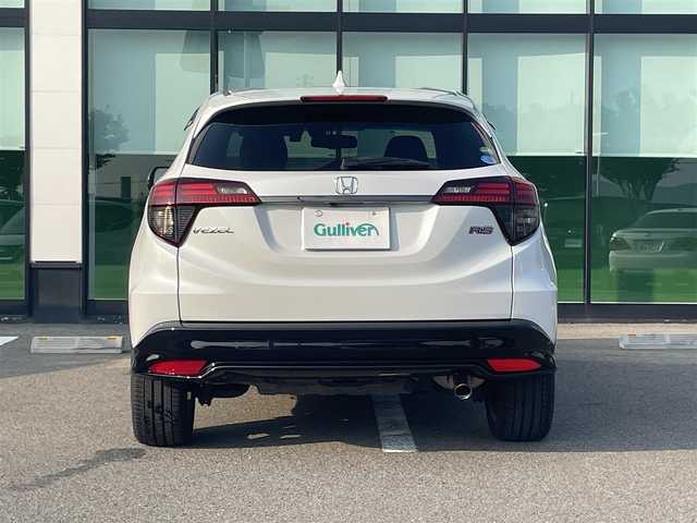 ホンダ ヴェゼル RS ホンダセンシング 和歌山県 2018(平30)年 5.2万km プラチナホワイトパール 純正7インチナビ（VXM-184VFi）/フルセグTV/Bluetooth/CD/DVD/バックカメラ/ETC/ドライブレコーダー/ホンダセンシング/衝突軽減カメラ/車線逸脱防止機能/アダプティブクルーズコントロール/革巻きステアリング/パドルシフト/ステアリングスイッチ/ハーフレザーシート/前席シートヒーター/電動パーキングブレーキ/オートブレーキホールド/LEDヘッドライト/フォグランプ/オートライト/純正18インチAW/ドアバイザー/プッシュスタート/スマートキー