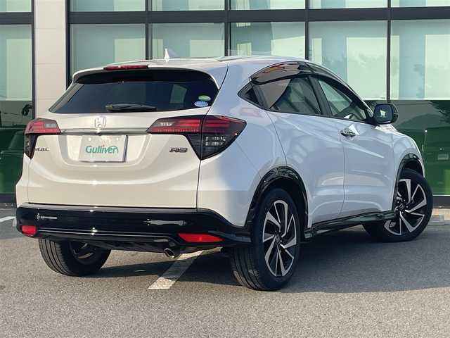 ホンダ ヴェゼル RS ホンダセンシング 和歌山県 2018(平30)年 5.2万km プラチナホワイトパール 純正7インチナビ（VXM-184VFi）/フルセグTV/Bluetooth/CD/DVD/バックカメラ/ETC/ドライブレコーダー/ホンダセンシング/衝突軽減カメラ/車線逸脱防止機能/アダプティブクルーズコントロール/革巻きステアリング/パドルシフト/ステアリングスイッチ/ハーフレザーシート/前席シートヒーター/電動パーキングブレーキ/オートブレーキホールド/LEDヘッドライト/フォグランプ/オートライト/純正18インチAW/ドアバイザー/プッシュスタート/スマートキー
