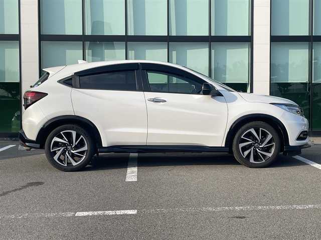 ホンダ ヴェゼル RS ホンダセンシング 和歌山県 2018(平30)年 5.2万km プラチナホワイトパール 純正7インチナビ（VXM-184VFi）/フルセグTV/Bluetooth/CD/DVD/バックカメラ/ETC/ドライブレコーダー/ホンダセンシング/衝突軽減カメラ/車線逸脱防止機能/アダプティブクルーズコントロール/革巻きステアリング/パドルシフト/ステアリングスイッチ/ハーフレザーシート/前席シートヒーター/電動パーキングブレーキ/オートブレーキホールド/LEDヘッドライト/フォグランプ/オートライト/純正18インチAW/ドアバイザー/プッシュスタート/スマートキー