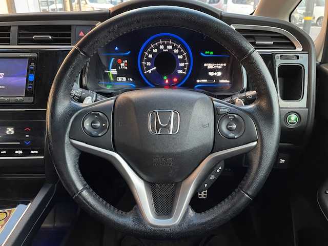 ホンダ シャトル ハイブリッド X スタイルエディション 宮城県 2016(平28)年 16.5万km クリスタルブラックパール 登録時走行距離165046km/ホンダ純正ナビ/AM・FM・Bluetooth・CD・DVD・USB/ワンオーナー/バックカメラ/アイドリングストップ/クルーズコントロール（追従なし）/プッシュスタート/ビルトインETC/純正アルミホイール/ドライブレコーダー（前後）/純正LEDヘッドライト/カーテンエアバッグ/フルフラットシート/スペアキー有/ドアバイザー/ウィンカーミラー