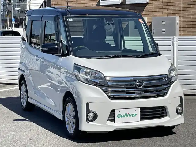 日産 デイズ ルークス ハイウェイスターX 群馬県 2016(平28)年 1.6万km アメジストブラック/シルキーホワイト 衝突軽減ブレーキ/社外メモリーナビ/ＣＤ　ワンセグＴＶ/アラウンドビューモニター/左側パワースライドドア/アイドリングストップ/リアドアサンシェード/助手席背面後席用ドリンクホルダー付きテーブル/横滑り防止/フォグランプ/スマートキー/保証書/取説/スペアキーｘ1