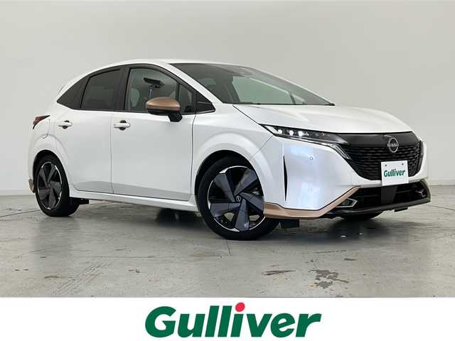 日産 オーラ G 宮城県 2022(令4)年 4.8万km ピュアホワイトパール 禁煙車/プロパイロット/エマージェンシーブレーキ/車線逸脱警報/アダプティブLEDヘッドライト/ブラインドスポットモニター/ハンドル支援/BOSEサウンドスピーカー/インテリジェントルームミラー/9型日産コネクトナビ/・BT.USB.AndroidAuto/アラウンドビューモニター/フルセグTV/電動パーキングブレーキ/AUTOHOLD/純正ドライブレコーダー(F)/ビルトインETC2.0/置き型充電/革巻きステアリング/ステアリングスイッチ/プッシュスタート/スマートキー×２/ハーフレザーシート/純正17インチアルミホイール/LEDフォグランプ/社外フロアマッド/横滑り防止機能/アイドリングストップ