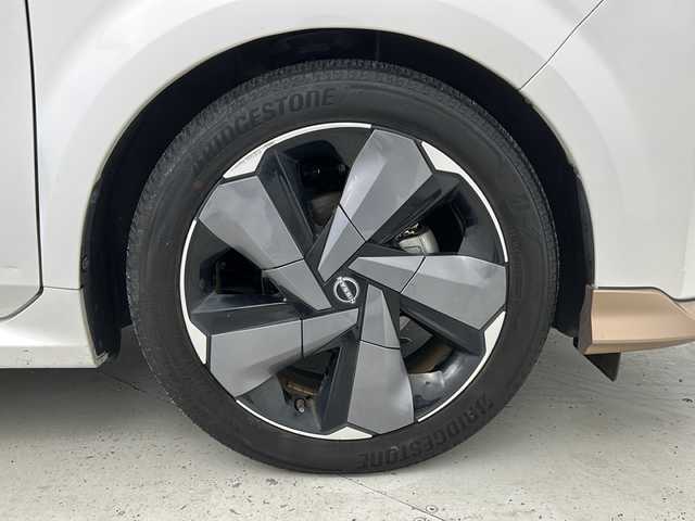 日産 オーラ G 宮城県 2022(令4)年 4.8万km ピュアホワイトパール 禁煙車/プロパイロット/エマージェンシーブレーキ/車線逸脱警報/アダプティブLEDヘッドライト/ブラインドスポットモニター/ハンドル支援/BOSEサウンドスピーカー/インテリジェントルームミラー/9型日産コネクトナビ/・BT.USB.AndroidAuto/アラウンドビューモニター/フルセグTV/電動パーキングブレーキ/AUTOHOLD/純正ドライブレコーダー(F)/ビルトインETC2.0/置き型充電/革巻きステアリング/ステアリングスイッチ/プッシュスタート/スマートキー×２/ハーフレザーシート/純正17インチアルミホイール/LEDフォグランプ/社外フロアマッド/横滑り防止機能/アイドリングストップ