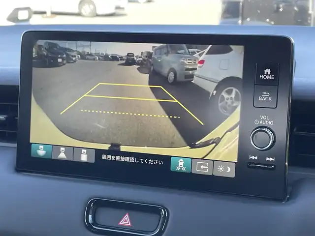 ホンダ ヴェゼル ハイブリッド e:HEV Z 滋賀県 2023(令5)年 1.2万km サンドカーキパール 純正9インチナビ/【Bluetooth/フルセグTV/USB】/バックカメラ/追従クルーズコントロール/クリアランスソナー/LEDヘッドライト/オートマチックハイビーム/ブラインドスポットインフォメーション/衝突被害軽減ブレーキ/レーンキープアシスト/前後ドライブレコーダー/D/Nシートヒーター/ワイヤレス充電/電動パーキングブレーキ/オートブレーキホールド/ビルトインETC2.0/パドルシフト/純正フロアマット/プッシュスタート/スマートキー/ステアリングリモコン