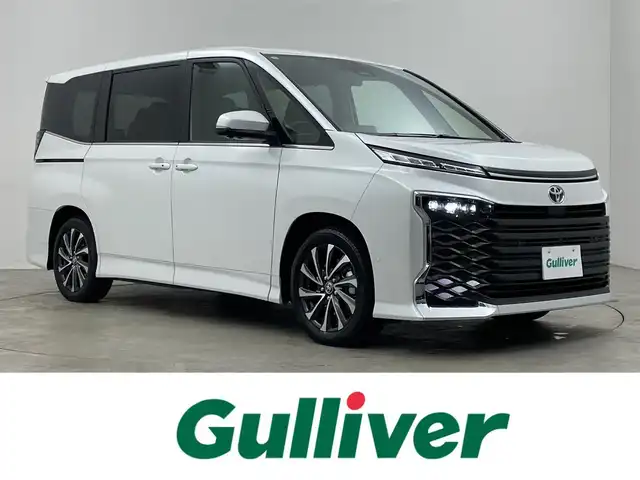 トヨタ ヴォクシー S－Z 埼玉県 2025(令7)年 0.1千km プラチナホワイトパールマイカ 登録済未使用車　快適利便パッケージ　純正１０．５インチディスプレイオーディオ　パノラミックビューモニター　ユニバーサルステップ　ＢＳＭ　ビルトインＥＴＣ２．０　　ＤＶＤ再生　三眼　シートヒーター　ＴＶ