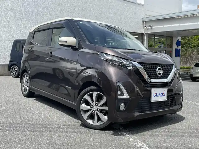 日産 デイズ ハイウェイスターG ターボ 福岡県 2019(令1)年 6.6万km フローズンバニラパール/アッシュブラウンM (株)IDOMが運営する【じしゃロン八幡西店】の自社ローン専用車両になります。こちらは現金またはオートローンご利用時の価格です。自社ローンご希望の方は別途その旨お申付け下さい/純正メモリナビ【MM319D-L】/TVキャンセラー/衝突軽減ブレーキ/横滑り防止機能/ステアリングリモコン/デジタルインナーミラー/アイドリングストップ/クリアランスソナー/エンジンプッシュスタート/バックカメラ/ETC/ベンチシート/純正フロアマット/純正サイドエアロ/純正15インチアルミホイール/LEDヘッドライト/フォグランプ/オートライト/ヘッドライトレベライザー