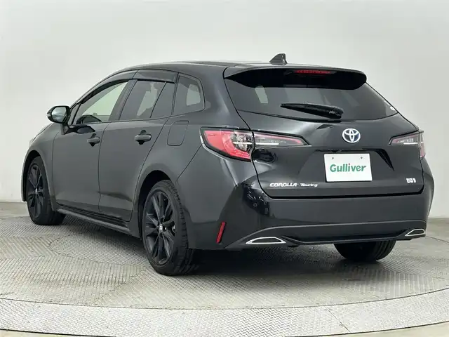トヨタ カローラツーリング ハイブリッド W×B 50ミリオンED 道央・札幌 2022(令4)年 0.9万km ブラックマイカ ・4WD/・純正ナビ/　BT/USB/・純正ETC/・社外前後ドライブレコーダー/・バックカメラ/・衝突軽減ブレーキ/・レーダークルーズコントロール/・レーンキープアシスト/・横滑り防止/・ブラインドスポットモニター/・アイドリングストップ/・純正フロアマット/・ハーフレザー/・純正17インチAW/・LEDヘッドライト/・オートライト/・プッシュスタート/・スマートキー×2/・取扱説明書