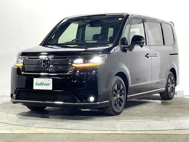 ホンダ ステップワゴン スパーダ eHEV 大阪府 2025(令7)年 0.1万km未満 クリスタルブラックパール 登録済未使用車 純正ナビ(フルセグ/DVD再生/Bluetooth) バックカメラ 後席モニター ハーフレザー シートヒーター 電動リアゲート 衝突軽減 レーダーC BSM クリアランスソナー