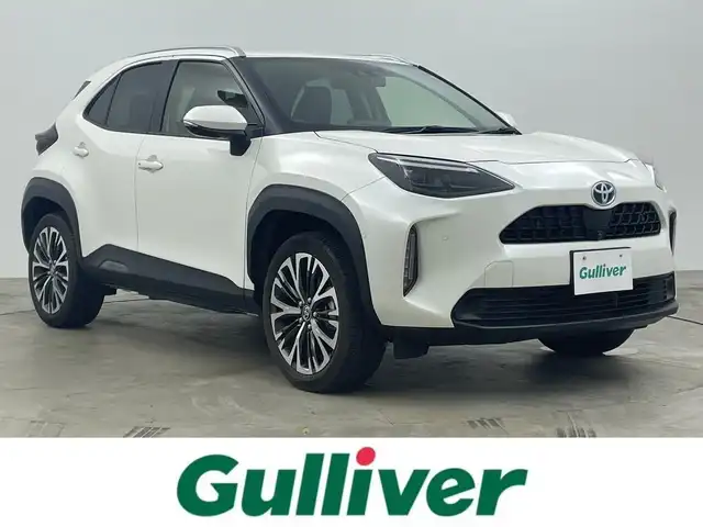 トヨタ ヤリスクロス ハイブリッド Z 岡山県 2021(令3)年 4.7万km ホワイトパールクリスタルシャイン 純正８インチディスプレイオーディオ/【ナビ/Bluetooth/フルセグTV/Carplay/iPod】/合皮ハーフレザー/パノラミックビューモニター/シルバールーフレール/カラーヘッドアップディスプレイ/アダプティブハイビームシステム/ＬＥＤヘッドライト/運転席シートヒーター/ステアリングヒーター/トヨタセーフティーセンス/衝突軽減ブレーキシステム/追従型クルーズコントロール/ビルトインＥＴＣ　/社外ドライブレコーダー（前後）/パワーバックドア/ブレーキホールド/ブラインドスポットモニター/ISOFIX/ステアリングスイッチ/チルトステアリング/シートリフター/ウインカーミラー