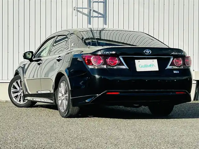 トヨタ クラウン ハイブリッド アスリートS 熊本県 2015(平27)年 13.1万km プレシャスブラックパール 純正SDメモリナビ（AM/FM/CD/DVD/SD/BT/AUX）/ビルトインETC/フルセグTV/布シート/シートヒーター（D席）/パワーシート（D.N席）/横滑り防止装置/衝突軽減ブレーキ/先行車発進お知らせ機能/LEDヘッドライト/オートライト/フォグランプ/純正革巻きステアリング/ステアリングスイッチ/ステアリングヒーター/電動格納ミラー/ウィンカーミラー/Wエアバック+カーテン+サイドエアバック/純正フロアマット/ドアバイザー