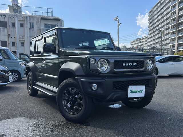 スズキ ジムニー ノマド FC 宮崎県 2025(令7)年 0.4万km Ｄグリーン ボディーカラー：ジャングルグリーン2（WA7 ）/スマートキー　社外ナビ　Bluetooth　バックカメラ　フルセグＴＶ　ＵＳＢ入力端子　クルーズコントロール　社外デジタルインナーミラー型ドライブレコーダー前後　４ＷＤ　アイドリングストップ　背面タイヤ　シートヒーター　コーナーセンサー　社外リアテール　社外サイドステップ