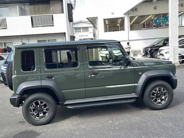 スズキ ジムニー ノマド FC 宮崎県 2025(令7)年 0.4万km Ｄグリーン ボディーカラー：ジャングルグリーン2（WA7 ）/スマートキー　社外ナビ　Bluetooth　バックカメラ　フルセグＴＶ　ＵＳＢ入力端子　クルーズコントロール　社外デジタルインナーミラー型ドライブレコーダー前後　４ＷＤ　アイドリングストップ　背面タイヤ　シートヒーター　コーナーセンサー　社外リアテール　社外サイドステップ