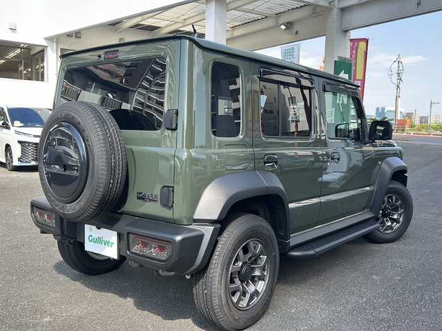 スズキ ジムニー ノマド FC 宮崎県 2025(令7)年 0.4万km Ｄグリーン ボディーカラー：ジャングルグリーン2（WA7 ）/スマートキー　社外ナビ　Bluetooth　バックカメラ　フルセグＴＶ　ＵＳＢ入力端子　クルーズコントロール　社外デジタルインナーミラー型ドライブレコーダー前後　４ＷＤ　アイドリングストップ　背面タイヤ　シートヒーター　コーナーセンサー　社外リアテール　社外サイドステップ
