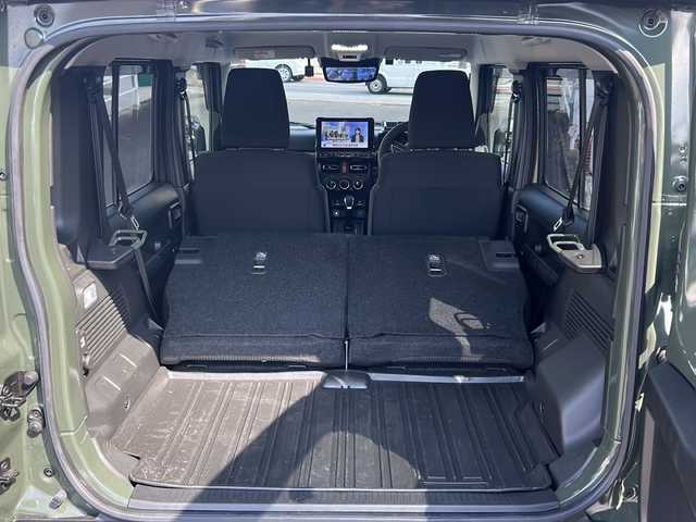 スズキ ジムニー ノマド FC 宮崎県 2025(令7)年 0.4万km Ｄグリーン ボディーカラー：ジャングルグリーン2（WA7 ）/スマートキー　社外ナビ　Bluetooth　バックカメラ　フルセグＴＶ　ＵＳＢ入力端子　クルーズコントロール　社外デジタルインナーミラー型ドライブレコーダー前後　４ＷＤ　アイドリングストップ　背面タイヤ　シートヒーター　コーナーセンサー　社外リアテール　社外サイドステップ