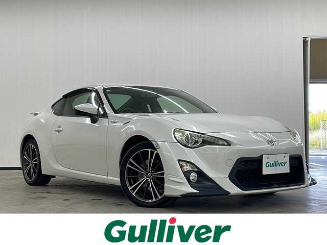 トヨタ ８６ GT リミテッド 長崎県 2012(平24)年 5.4万km サテンホワイトパール 純正ナビ（NSZT-W62G）/・フルセグ/・DVD/・Bluetooth/TRDエアロ/バックカメラ/パドルシフト/ハーフレザーシート/前席シートヒーター/HIDライト/フォグ/スポーツペダル/黒革ハンドル/バイザー/純正フロアマット/ETC/スマートキー/取説/保証書