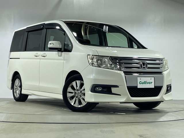 ホンダ ステップワゴン スパーダ Z 神奈川県 2011(平23)年 7.7万km プレミアムホワイトパール 純正7インチワイドHDDナビ/両側パワースライドドア/フリップダウンモニター/バックカメラ/純正16インチAW/横滑り防止装置/フォグランプ/オートライト/ウィンカーミラー/電動格納ミラー/シートリフター/パドルシフト/スマートキー/フロアマット/取扱説明書/保証書