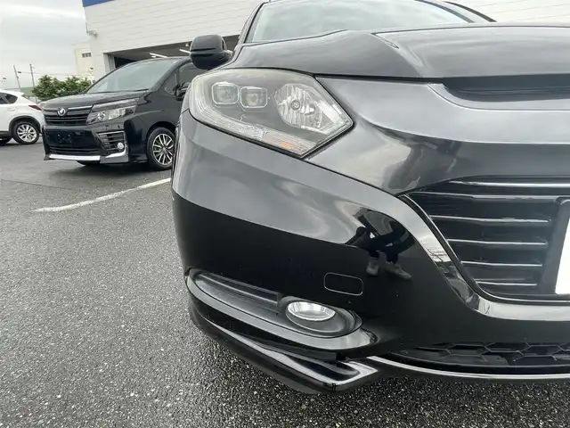 ホンダ ヴェゼル ハイブリッド Z 熊本県 2014(平26)年 10.8万km クリスタルブラックパール (株)IDOMが運営する【じしゃロン熊本店】の自社ローン専用車両になります。こちらは現金またはオートローンご利用時の価格です。自社ローンご希望の方は別途その旨お申付け下さい　/社外ナビ/バックカメラ/フルセグテレビ/DVD/CD/Bluetooth接続/ETC/ハーフレザーシート/シートヒーター/クルーズコントロール/LEDヘッドライト/オートライト/スマートキー/純正アルミホイール
