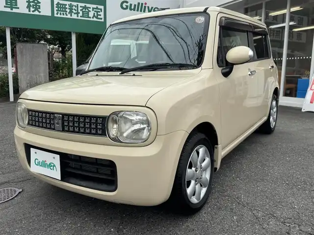 スズキ ラパン 10thアニバーサリーリミテッド 愛知県 2012(平24)年 5.9万km ミルクティーベージュメタリック ユーザー買取車/取説/手帳/保証書/禁煙車/ディーラーオプション　ナビ/フルセグTV GCX711/特別仕様車　10THアニバーサーリーリミテッド/スマートキー　プッシュスタート/ビルトインETC/ドアミラーウインカー/D席シートヒーター/革ステアリング/純正フロアマット/バイザー