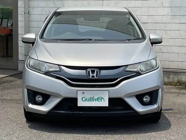 ホンダ フィット 13G Fパッケージ 大分県 2014(平26)年 12.6万km アラバスターシルバーメタリック ワンオーナー/純正メモリナビ VXM-145VSi/【ワンセグ/CD/BTオーディオ】/バックカメラ/フォグランプ/ヘッドライトレベライザー/ステアリングリモコン/チルトステアリング/運転席シートリフター/横滑り防止装置/エンジンプッシュスタート/アイドリングストップ/ウインカーミラー/リアプライバシーガラス/ドアバイザー/フロアマット/電動格納ミラー/Wエアバッグ/ABS/スマートキー×2/保証書/車両取説