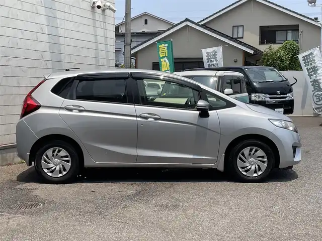 ホンダ フィット 13G Fパッケージ 大分県 2014(平26)年 12.6万km アラバスターシルバーメタリック ワンオーナー/純正メモリナビ VXM-145VSi/【ワンセグ/CD/BTオーディオ】/バックカメラ/フォグランプ/ヘッドライトレベライザー/ステアリングリモコン/チルトステアリング/運転席シートリフター/横滑り防止装置/エンジンプッシュスタート/アイドリングストップ/ウインカーミラー/リアプライバシーガラス/ドアバイザー/フロアマット/電動格納ミラー/Wエアバッグ/ABS/スマートキー×2/保証書/車両取説