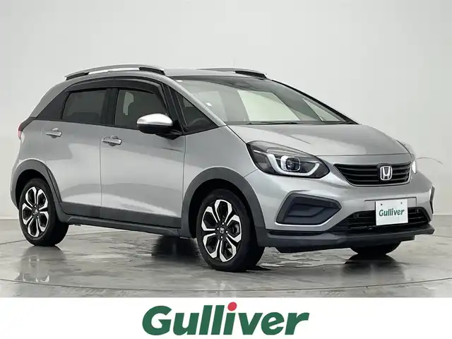 ホンダ フィット e:HEVクロスター 滋賀県 2020(令2)年 4.3万km ルナシルバーM 純正8型ナビ/CD/DVD/Bluetooth/フルセグTV/バックカメラ/ホンダセンシング/レーダークルーズコントロール/レーンキープアシスト/ETC/レザー調シートカバー/ステアリングスイッチ/前後ドラレコ/LEDヘッドライト/オートライト/前後ドラレコ/電動パーキング/ブレーキホールド/純正アルミホイール