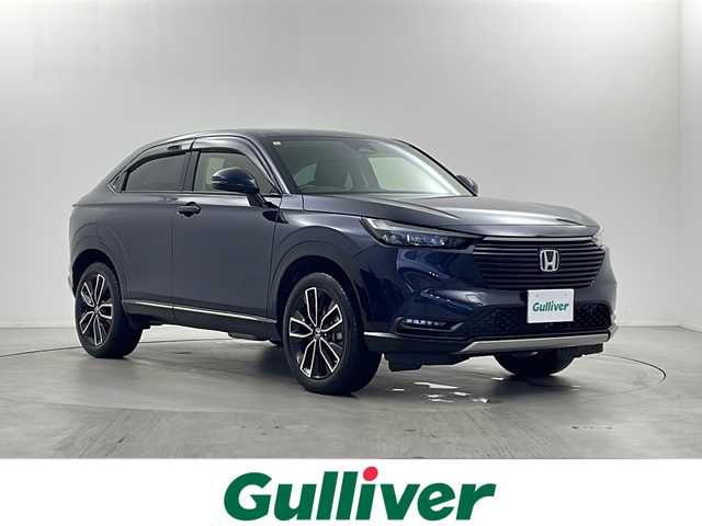ホンダ ヴェゼル ハイブリッド e:HEV Z 栃木県 2024(令6)年 1.2万km ミッドナイトブルービームM 純正ナビ/（フルセグ/Bluetooth/CD/DVD/SD）/ダウンヒルアシストコントロール/衝突軽減ブレーキ/レーンキープアシスト/アダプティブクルーズコントロール/ブラインドスポットモニター/パワーバックドア/ハーフレザーシート/シートヒーター/ステアリングヒーター/ETC/バックカメラ/スマートキー/プッシュスタート/LEDヘッドライト