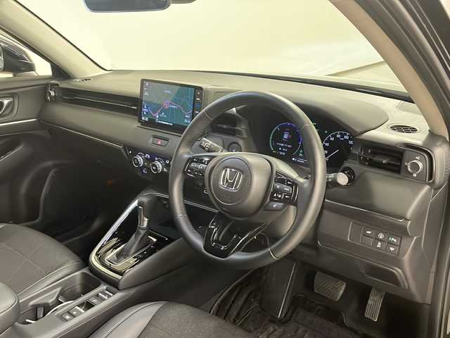 ホンダ ヴェゼル ハイブリッド e:HEV Z 熊本県 2024(令6)年 1.2万km ミッドナイトブルービームM 純正ナビ/（フルセグ/Bluetooth/CD/DVD/SD）/ダウンヒルアシストコントロール/衝突軽減ブレーキ/レーンキープアシスト/アダプティブクルーズコントロール/ブラインドスポットモニター/パワーバックドア/ハーフレザーシート/シートヒーター/ステアリングヒーター/ETC/バックカメラ/スマートキー/プッシュスタート/LEDヘッドライト