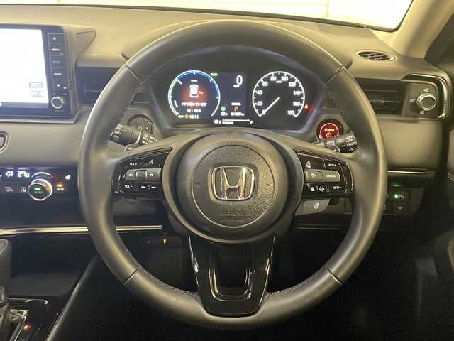 ホンダ ヴェゼル ハイブリッド e:HEV Z 熊本県 2024(令6)年 1.2万km ミッドナイトブルービームM 純正ナビ/（フルセグ/Bluetooth/CD/DVD/SD）/ダウンヒルアシストコントロール/衝突軽減ブレーキ/レーンキープアシスト/アダプティブクルーズコントロール/ブラインドスポットモニター/パワーバックドア/ハーフレザーシート/シートヒーター/ステアリングヒーター/ETC/バックカメラ/スマートキー/プッシュスタート/LEDヘッドライト