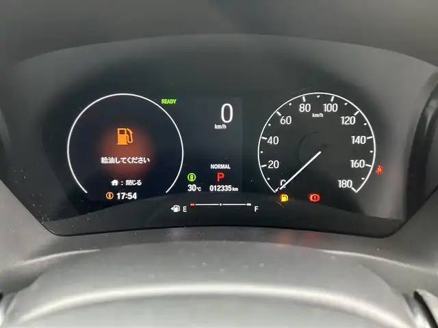 ホンダ ヴェゼル ハイブリッド e:HEV X 愛媛県 2022(令4)年 1.3万km クリスタルブラックパール 純正ナビ（Bluetooth/DVD）/ETC/前後ドライブレコーダー/バックカメラ/Honda SENSING/衝突軽減ブレーキ（CMBS）/誤発進抑制機能/歩行者事故低減ステアリング/路外逸脱抑制機能/渋滞追従機能付アダプティブクルーズコントロール（ACC）/車線維持支援システム（LKAS）/先行車発進お知らせ機能/標識認識機能/後方誤発進抑制機能/USB入力端子/純正16インチアルミホイール/純正フロアマット/ドアバイザー/LEDヘッドライト/オートマチックハイビーム/フォグランプ/プッシュスタート/スマートキー
