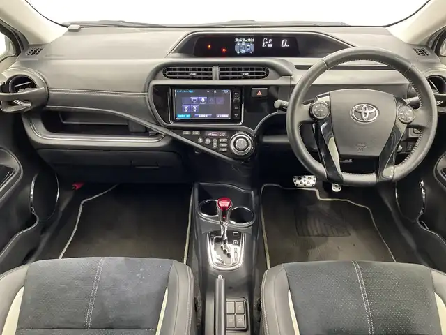 トヨタ アクア G G’s 栃木県 2015(平27)年 5.9万km ライムホワイトパールクリスタルシャイン 純正ナビ/(Bluetooth/CD/DVD/フルセグTV/MSV/SD)/ミラー型ドラレコ/バックカメラ/ETC/ハーフレザーシート/オートライト/LEDヘッドライト/横滑り防止装置/フォグランプ/スマートキー/プッシュスタート/アイドリングストップ/ステアリングスイッチ/ウィンカーミラー/電動格納ミラー/純正17インチアルミホイール/純正フロアマット/デイライト/ドアバイザー