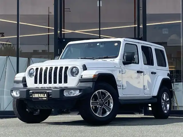 クライスラー・ジープ ジープ ラングラー アンリミテッド サハラ 福岡県 2023(令5)年 2.8万km 白 １オーナー/ACC/純正ナビ/フルセグ/バックカメラ/フロントカメラ/黒革/シートヒーター/ステアリングヒーター/ETC/前後ドラレコ/前後コーナーセンサー/オートライト/保証書/取説/スペアキー