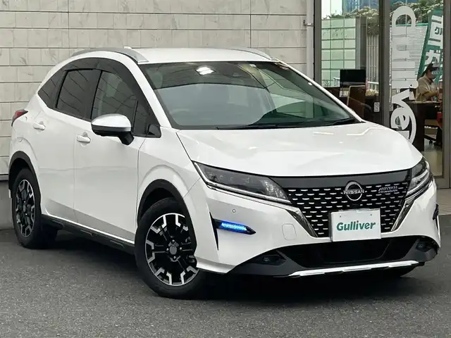 日産 ノート オーテック Xオーバー FOUR +アクティブ 埼玉県 2023(令5)年 2.3万km ピュアホワイトパール 登録時22341km/ワンオーナー/4WD/日産コネクトナビ(AM/FM/BT/フルセグTV)/B・F・S・全方位カメラ/純正ドライブレコーダー（前）/クルーズコントロール追従有/BSM/プロパイロット/前後コーナーセンサー/置くだけ充電/ビルトインETC2.0/純正フロアマット/純正ドアバイザー/ルーフレール/ＡＵＴＥＣＨ専用インテリア/専用ブラックレザレットシート/専用ブラック本革巻ステアリング/前席シートヒーター/ステアリングヒーター/ステアリングスイッチ/AUTECH16インチAW/純正ＬＥＤヘッドライト/フォグランプ/オートライト/トノカバー/横滑り防止装置/プッシュスタート/スマートキー/スペアキー1本/車両/ナビ取扱説明書/保証書