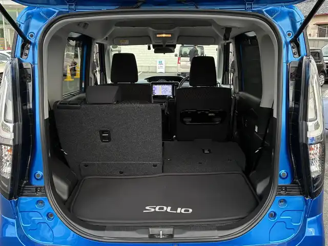 スズキ ソリオ バンディット HV MV 愛知県 2022(令4)年 0.9万km スピーディーブルーM ワンオーナー　/純正１０型ナビ　/・フルセグＴＶ　/・Ｂｌｕｅｔｏｏｔｈ　/・CD/DVD/片側パワスラ　/シートヒーター(D/N)/ヘッドアップディスプレイ　/レーダークルーズ　/車線逸脱警報　/前後ドラレコ　/純正フロアマット　/純正ＡＷ　/フォグランプ　/保証書　/取扱説明書