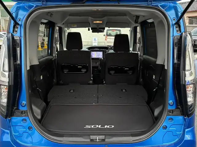 スズキ ソリオ バンディット HV MV 愛知県 2022(令4)年 0.9万km スピーディーブルーM ワンオーナー　/純正１０型ナビ　/・フルセグＴＶ　/・Ｂｌｕｅｔｏｏｔｈ　/・CD/DVD/片側パワスラ　/シートヒーター(D/N)/ヘッドアップディスプレイ　/レーダークルーズ　/車線逸脱警報　/前後ドラレコ　/純正フロアマット　/純正ＡＷ　/フォグランプ　/保証書　/取扱説明書