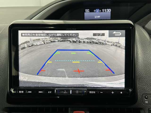 トヨタ ヴォクシー ハイブリッド ZS 煌 茨城県 2018(平30)年 9.6万km イナズマスパーキングブラックガラスフレーク ALPINEナビ（X9Z）/【フルセグTV/CD/DVD/Bluetooth】/バックカメラ/ALPINE12.8インチフリップダウンモニター/両側パワースライドドア/プリクラッシュセーフティ/レーンディパーチャーアラート/クルーズコントロール/横滑り防止装置/ドライブレコーダー/前席シートヒーター/純正16インチAW/ETC/オートハイビーム/オートライト/フォグランプ/純正フロアマット/純正ドアバイザー/ISOFIX