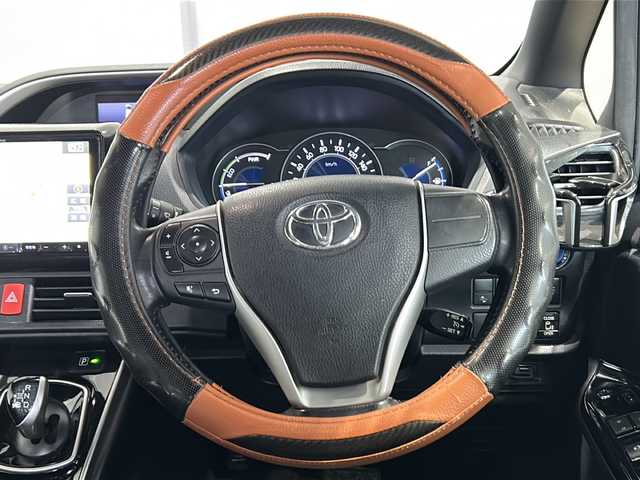 トヨタ ヴォクシー ハイブリッド ZS 煌 茨城県 2018(平30)年 9.6万km イナズマスパーキングブラックガラスフレーク ALPINEナビ（X9Z）/【フルセグTV/CD/DVD/Bluetooth】/バックカメラ/ALPINE12.8インチフリップダウンモニター/両側パワースライドドア/プリクラッシュセーフティ/レーンディパーチャーアラート/クルーズコントロール/横滑り防止装置/ドライブレコーダー/前席シートヒーター/純正16インチAW/ETC/オートハイビーム/オートライト/フォグランプ/純正フロアマット/純正ドアバイザー/ISOFIX