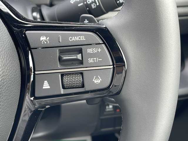 ホンダ ステップワゴン スパーダ eHEV 三重県 2025(令7)年 0.1千km クリスタルブラックパール 登録済未使用車/純正11.4型ナビ(AM/FM/CD/DVD/TV/BT)/純正15.6型リア席モニター/バックカメラ/BSM/前席シートヒーター/電動リヤゲート/スペアキー/オットマン/USB・タイプC給電ポート/革巻きステアリング/コーナーセンサー/レーダークルーズコントロール/パドルシフト/ウォークスルー/オートハイビーム/両側パワースライドドア/デイライト/電動格納ミラー/禁煙車