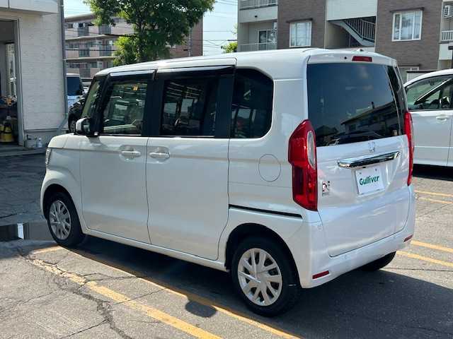 ホンダ Ｎ ＢＯＸ L 道東・釧路十勝 2023(令5)年 1.3万km プラチナホワイトパール ４WD/ホンダセンシング/純正ナビ/CD/DVD/BT/MSV/フルセグTV/バックカメラ /両側パワースライドドア/前席シートヒーター/ミラーヒーター/LEDヘッドライト/サイドエアバック/カーテンエアバック/オートライト/ドアバイザー